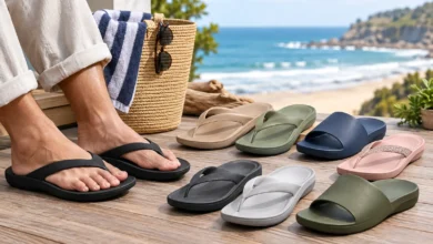 Archies Footwear arch support flip flops and slides in a beachside setting