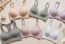 Collection of comfortable bras and bralettes arranged on a soft beige background