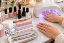 Complete gel nail kit with UV LED lamp, gel polish bottles, nail files, and manicure tools for home use.